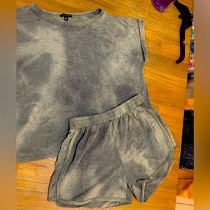 Matching olive green cropped short sleeve sweater and shorts with pockets set.